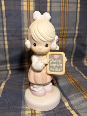 Precious Moments - “Sharing Begins in the Heart”